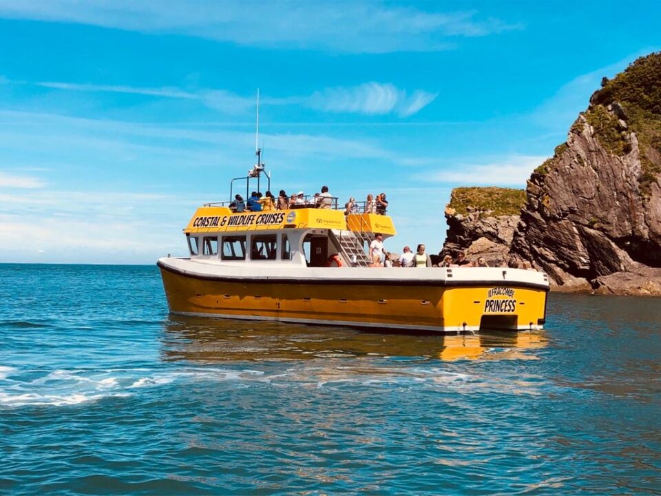 Hidden gems of the North Devon coast including Smugglers Caves, Broadsands Beach and Exmoor cliffs viewed from a boat trip near Ilfracombe